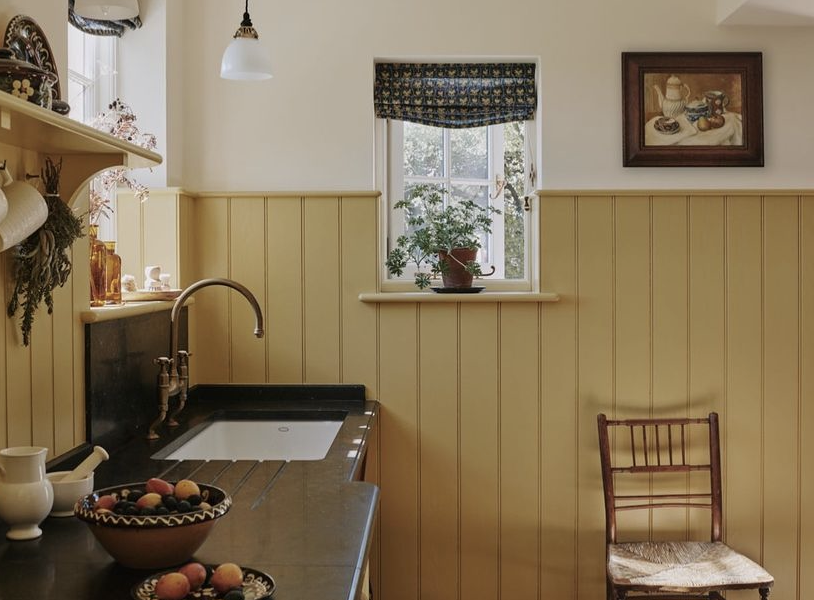 A kitchen by Artichoke with panelling