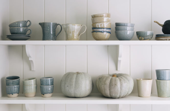 Aerende collection of ceramics on shelves