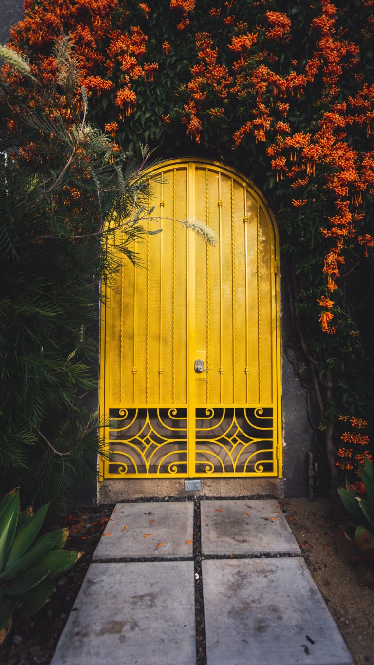 Yellow door and flowers